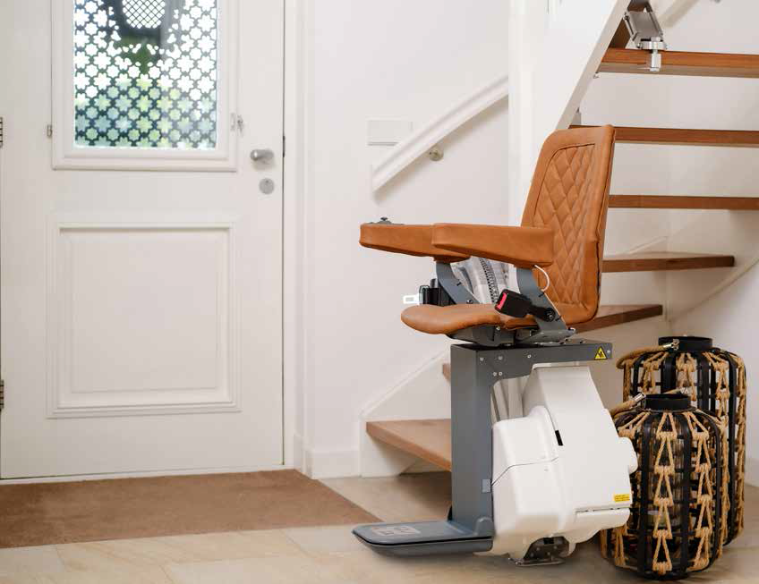 UP Stairlift Singapore installed on residential staircase providing safe and comfortable mobility solution for elderly and home users